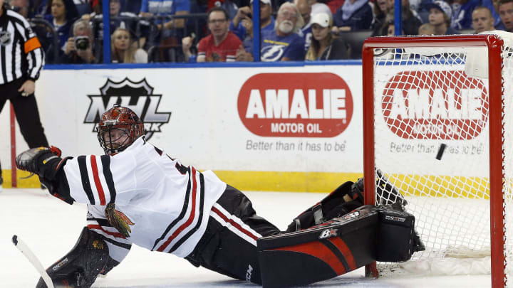 Mar 27, 2017; Tampa, FL, USA; Chicago Blackhawks goalie Scott Darling (33) makes a save against the Tampa Bay Lightning during the second period at Amalie Arena. Mandatory Credit: Kim Klement-USA TODAY Sports