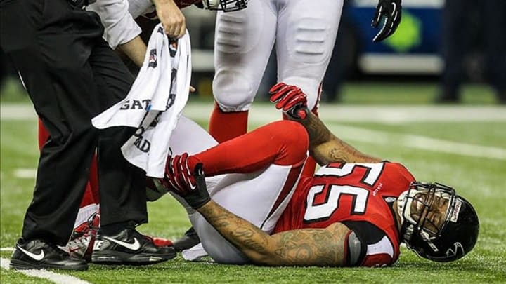 Dec 30, 2012; Atlanta, GA, USA; Atlanta Falcons defensive end John Abraham (55) comes out of the game after an injury in the second half against the Tampa Bay Buccaneers at the Georgia Dome. Tampa Bay won 22-17. Mandatory Credit: Daniel Shirey-USA TODAY Sports