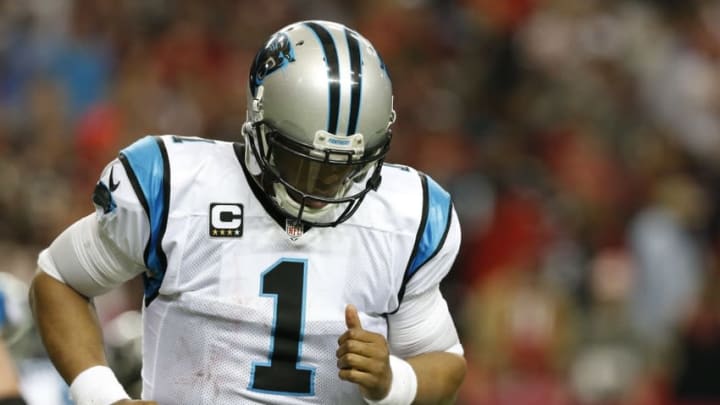 Dec 27, 2015; Atlanta, GA, USA; Carolina Panthers quarterback Cam Newton (1) reacts after fumbling Atlanta Falcons in the fourth quarter at the Georgia Dome. Mandatory Credit: Jason Getz-USA TODAY Sports