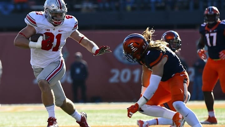 Nov 14, 2015; Champaign, IL, USA; Ohio State Buckeyes tight end Nick Vannett (81) makes a catch against Illinois Fighting Illini defensive back Taylor Barton (3) during the fourth quarter at Memorial Stadium. Ohio State defats Illinois 28-3. Mandatory Credit: Mike DiNovo-USA TODAY Sports