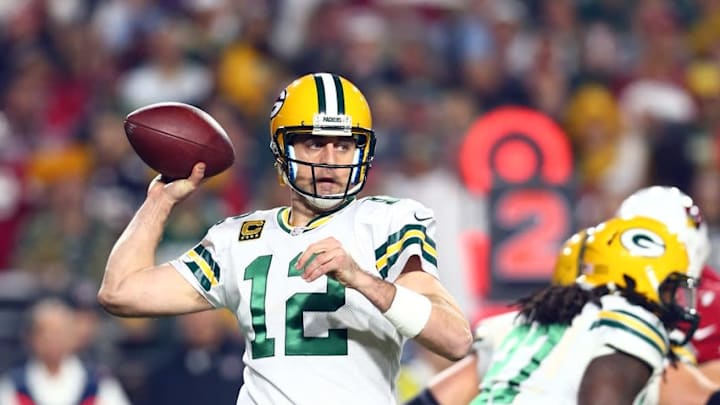 Jan 16, 2016; Glendale, AZ, USA; Green Bay Packers quarterback Aaron Rodgers (12) throws a pass against the Arizona Cardinals in the first quarter of a NFC Divisional round playoff game at University of Phoenix Stadium. Mandatory Credit: Mark J. Rebilas-USA TODAY Sports