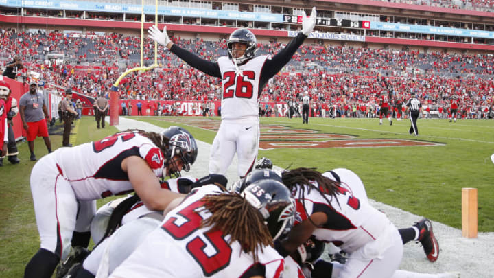 TAMPA, FLORIDA - DECEMBER 29: The Atlanta Falcons celebrate after Deion Jones #45 intercepted a pass by Jameis Winston #3 (not pictured) for a touchdown to defeat the Tampa Bay Buccaneers 28-22 in overtime at Raymond James Stadium on December 29, 2019 in Tampa, Florida. (Photo by Michael Reaves/Getty Images)
