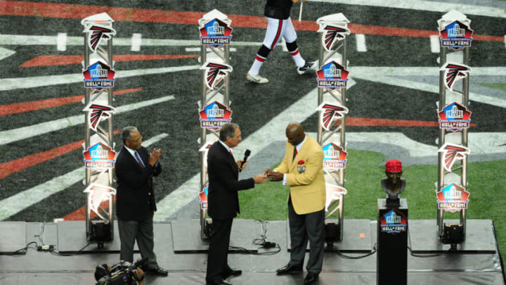 ATLANTA, GA - OCTOBER 16: Former Atlanta Falcon Deion Sanders is presented with his Hall Of Fame ring by team owner Arthur Blank at halftime of the game against the Carolina Panthers at the Georgia Dome on October 16, 2011 in Atlanta, Georgia. (Photo by Scott Cunningham/Getty Images)