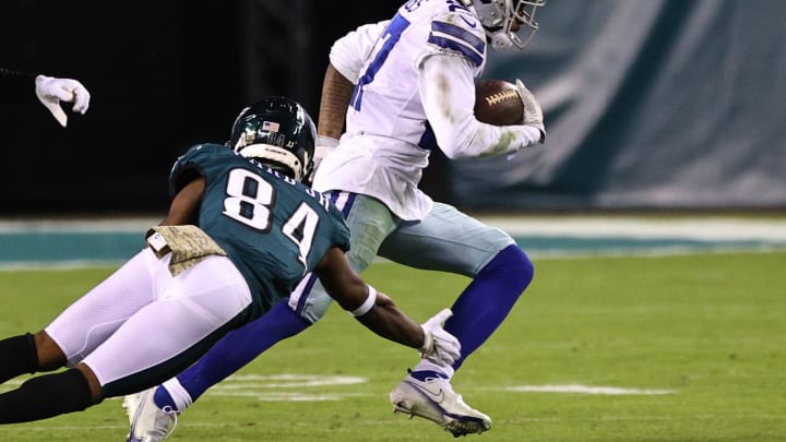 PHILADELPHIA, PENNSYLVANIA – NOVEMBER 01: Trevon Diggs #27 of the Dallas Cowboys returns an interception as Greg Ward #84 of the Philadelphia Eagles dives for the tackle in the third quarter of the game at Lincoln Financial Field on November 01, 2020 in Philadelphia, Pennsylvania. (Photo by Elsa/Getty Images)