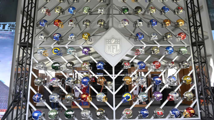 CLEVELAND, OHIO - APRIL 28: Wall of NFL team helmets on display in the NFL Locker Room at the NFL Draft Experience on April 28, 2021 in Cleveland, Ohio. (Photo by Duane Prokop/Getty Images)