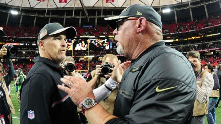 ATLANTA, GA - NOVEMBER 27: Head coach Dan Quinn of the Atlanta Falcons shakes hands with head coach Bruce Arians of the Arizona Cardinals after the game at the Georgia Dome on November 27, 2016 in Atlanta, Georgia. (Photo by Scott Cunningham/Getty Images)