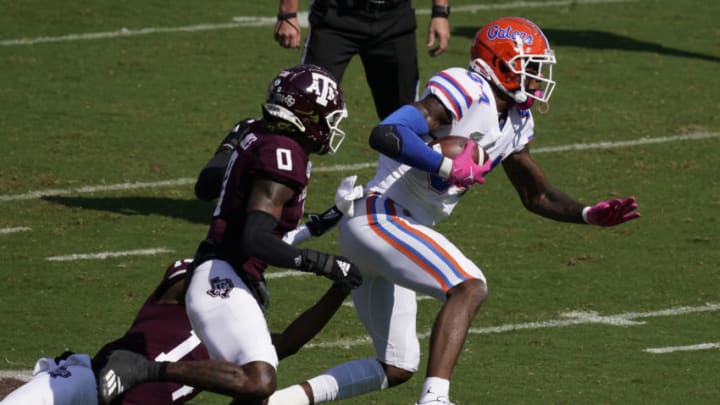 Oct 10, 2020; College Station, Texas, USA; Florida Gators tight end Kyle Pitts (84) runs after catching a pass as Texas A&M Aggies defensive back Myles Jones defends at Kyle Field. Mandatory Credit: Scott Wachter-USA TODAY Sports