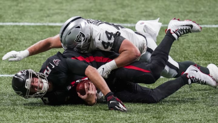 Nov 29, 2020; Atlanta, Georgia, USA; Las Vegas Raiders linebacker Nick Kwiatkoski (44) sacks Atlanta Falcons quarterback Matt Ryan (2) during the first half at Mercedes-Benz Stadium. Mandatory Credit: Dale Zanine-USA TODAY Sports