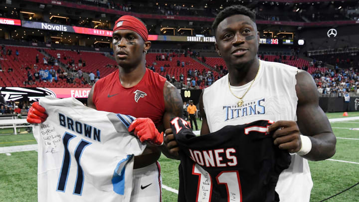 Atlanta Falcons wide receiver Julio Jones (11) and Tennessee Titans wide receiver A.J. Brown (11) exchange jerseys after the Titans’ 24-10 win at Mercedes-Benz Stadium Sunday, Sept. 29, 2019 in Atlanta, Ga.