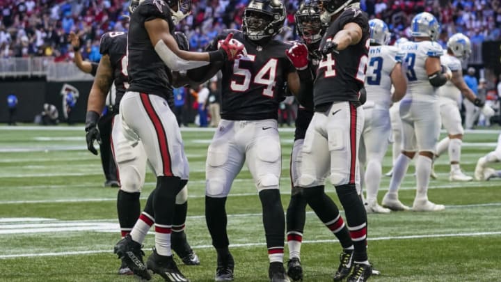 Dec 26, 2021; Atlanta, Georgia, USA; Atlanta Falcons inside linebacker Foye Oluokun (54) reacts with teammates after intercepting a pass against the Detroit Lions during the fourth quarter at Mercedes-Benz Stadium. Mandatory Credit: Dale Zanine-USA TODAY Sports