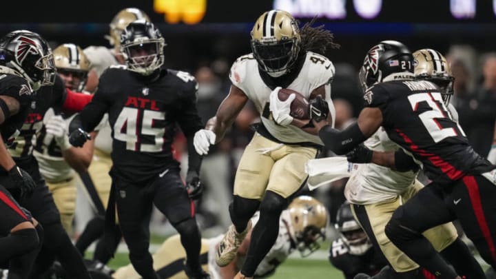 Jan 9, 2022; Atlanta, Georgia, USA; New Orleans Saints running back Alvin Kamara (41) runs against the Atlanta Falcons during the second half at Mercedes-Benz Stadium. Mandatory Credit: Dale Zanine-USA TODAY Sports