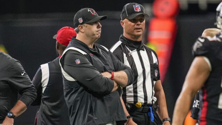 Sep 11, 2022; Atlanta, Georgia, USA; Atlanta Falcons head coach Arthur Smith talks with an official on the field prior to the game against the New Orleans Saints at Mercedes-Benz Stadium. Mandatory Credit: Dale Zanine-USA TODAY Sports