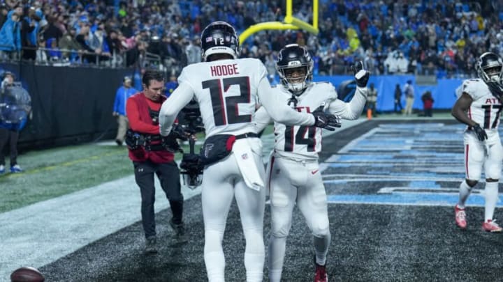 Nov 10, 2022; Charlotte, North Carolina, USA; Atlanta Falcons wide receivers KhaDarel Hodge (12) and Damiere Byrd (14) celebrate after a Hodges touchdown during the second half against the Carolina Panthers at Bank of America Stadium. Mandatory Credit: Jim Dedmon-USA TODAY Sports