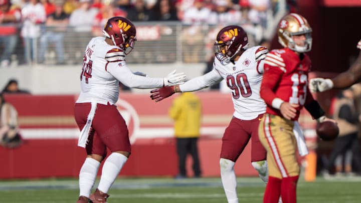 Dec 24, 2022; Santa Clara, California, USA; Washington Commanders defensive tackle Daron Payne (94) and defensive end Montez Sweat (90) celebrate after sacking San Francisco 49ers quarterback Brock Purdy (13) during the first quarter at Levi's Stadium. Mandatory Credit: Stan Szeto-USA TODAY Sports