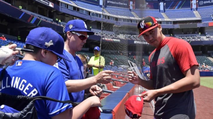 MONTERREY, MEXICO - APRIL 14: Robert Stephenson, #55 of the Cincinnati Reds, signs autographs prior the second game of the Mexico Series between the Cincinnati Reds and the St. Louis Cardinals at Estadio de Beisbol Monterrey on April 14, 2019 in Monterrey, Nuevo Leon. (Photo by Azael Rodriguez/Getty Images)