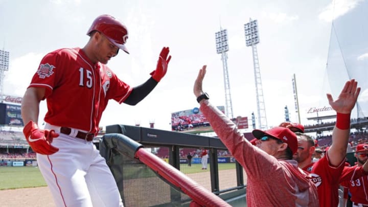 CINCINNATI, OH - MAY 06: Nick Senzel #15 of the Cincinnati Reds is greeted by manager David Bell after hitting a solo home run in the first inning against the San Francisco Giants at Great American Ball Park on May 6, 2019 in Cincinnati, Ohio. (Photo by Joe Robbins/Getty Images)