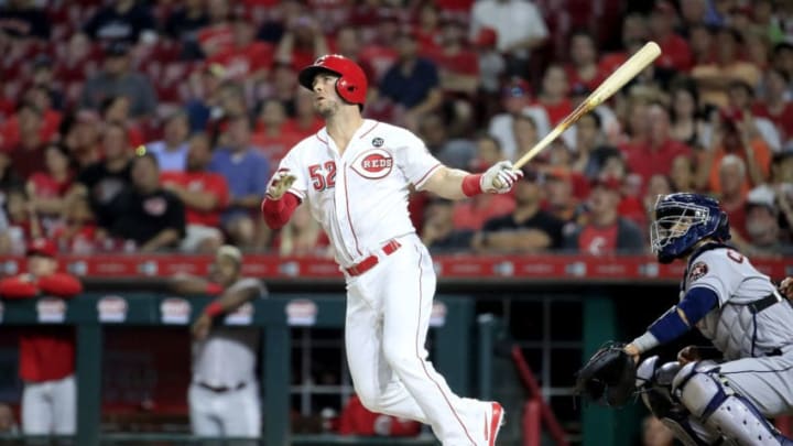 CINCINNATI, OHIO - JUNE 18: Kyle Farmer #52 of the Cincinnati Reds hits a home run in the 7th inning against the Houston Astros at Great American Ball Park on June 18, 2019 in Cincinnati, Ohio. (Photo by Andy Lyons/Getty Images)
