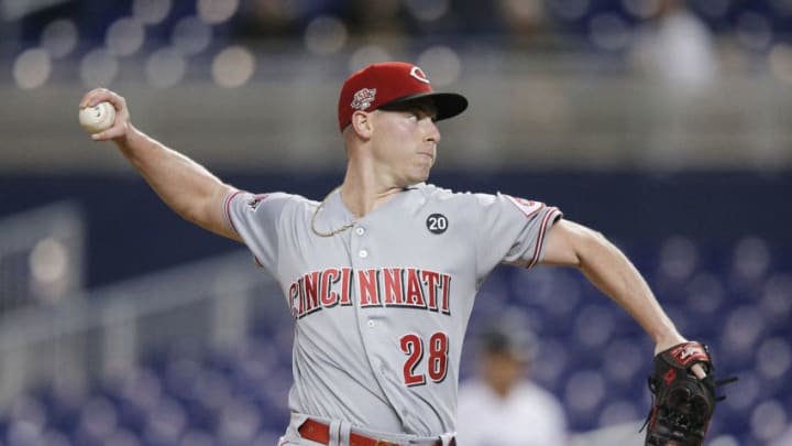 MIAMI, FLORIDA - AUGUST 28: Anthony DeSclafani #28 of the Cincinnati Reds delivers a pitch against the Miami Marlins during the first inning at Marlins Park on August 28, 2019 in Miami, Florida. (Photo by Michael Reaves/Getty Images)