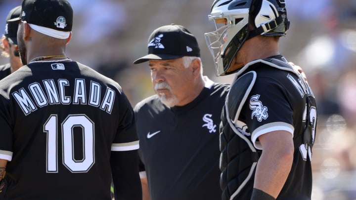 Manager Rick Renteria #17 of the Chicago White Sox makes a pitching change during the game against the Cincinnati Reds.