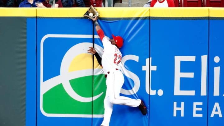 CINCINNATI, OH - APRIL 12: Phillip Ervin #27 of the Cincinnati Reds jumps to catch the ball hit by Jose Martinez of the St. Louis Cardinals in the third inning at Great American Ball Park on April 12, 2018 in Cincinnati, Ohio. (Photo by Andy Lyons/Getty Images)