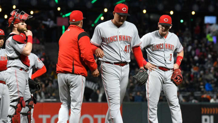 SAN FRANCISCO, CA - MAY 14: Interim manager Jim Riggleman #35 of the Cincinnati Reds takes the ball from starting pitcher Sal Romano #47 taking Romano out of the game against the San Francisco Giants in the bottom of the third innng at AT&T Park on May 14, 2018 in San Francisco, California. (Photo by Thearon W. Henderson/Getty Images)