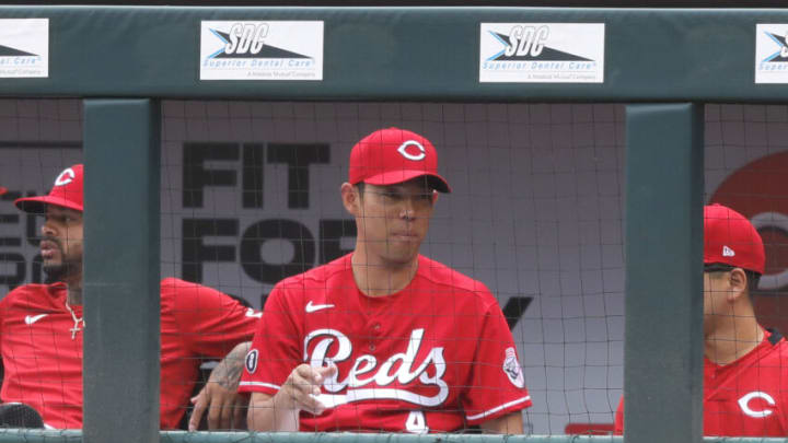 Jun 10, 2021; Cincinnati, Ohio, USA; Cincinnati Reds out fielder Shogo Akiyama (4) watches from the dugout. Mandatory Credit: David Kohl-USA TODAY Sports