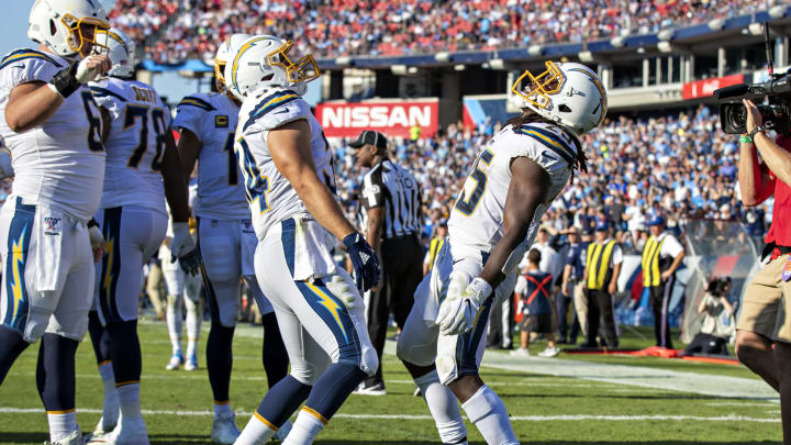 NASHVILLE, TN – OCTOBER 20: Melvin Gordon III #25 and Derek Watt #34 of the Los Angeles Chargers celebrate after a touchdown during a game against the Tennessee Titans at Nissan Stadium on October 20, 2019, in Nashville, Tennessee. The Titans defeated the Chargers 23-20. (Photo by Wesley Hitt/Getty Images)