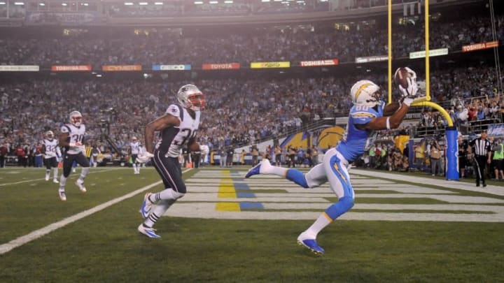 SAN DIEGO, CA- DECEMBER 7: Malcom Floyd #80 of the San Diego Chargers catches a touchdown pass against Brandon Browner #39 of the New England Patriots during an NFL game at Qualcomm Stadium on December 7, 2014 in San Diego, California. (Photo by Donald Miralle/Getty Images) SAN DIEGO, CA- DECEMBER 7: Malcom Floyd #80 of the San Diego Chargers catches a touchdown pass against Brandon Browner #39 of the New England Patriots during an NFL game at Qualcomm Stadium on December 7, 2014 in San Diego, California. (Photo by Donald Miralle/Getty Images)