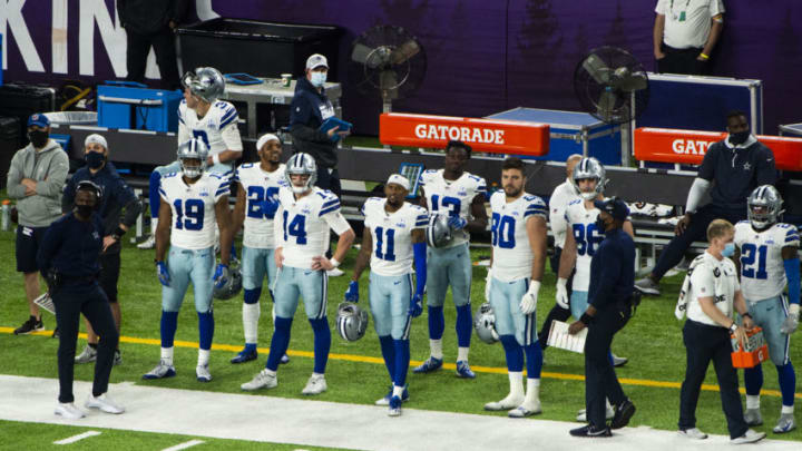 MINNEAPOLIS, MN - NOVEMBER 22: Andy Dalton #14 of the Dallas Cowboys stands on the sidelines in the fourth quarter of the game against the Minnesota Vikings at U.S. Bank Stadium on November 22, 2020 in Minneapolis, Minnesota. (Photo by Stephen Maturen/Getty Images)