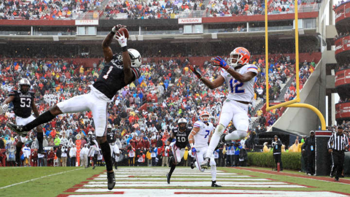 COLUMBIA, SOUTH CAROLINA - OCTOBER 19: Jaycee Horn #1 of the South Carolina Gamecocks goes after a pass against C.J. McWilliams #12 of the Florida Gators during their game at Williams-Brice Stadium on October 19, 2019 in Columbia, South Carolina. (Photo by Streeter Lecka/Getty Images)