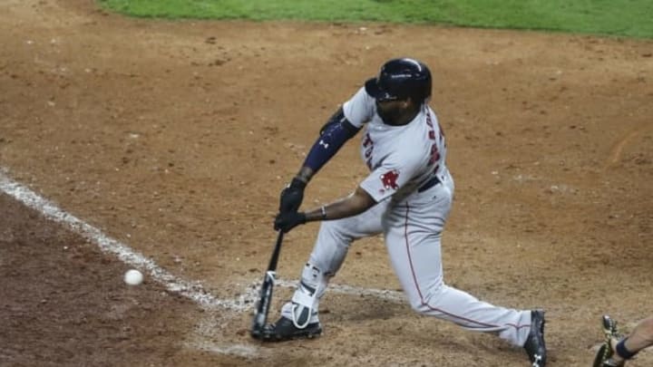 Apr 24, 2016; Houston, TX, USA; Boston Red Sox center fielder Jackie Bradley Jr. (25) drives in a run with a single during the twelfth inning against the Houston Astros at Minute Maid Park. Mandatory Credit: Troy Taormina-USA TODAY Sports