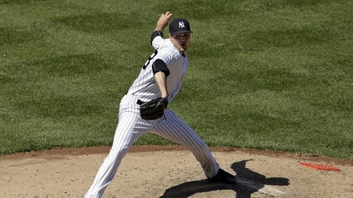 Jun 30, 2016; Bronx, NY, USA; New York Yankees relief pitcher Andrew Miller (48) pitches against the Texas Rangers during the eighth inning at Yankee Stadium. Yankees won 2-1. Mandatory Credit: Adam Hunger-USA TODAY Sports