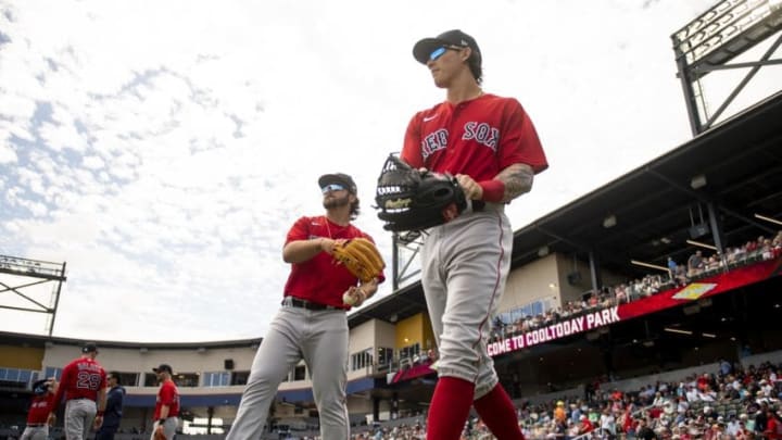 NORTH PORT, FL - MARCH 6: Nick Longhi #83 and Jarren Duran #92 of the Boston Red Sox warm up before a Grapefruit League game against the Atlanta Braves on March 6, 2020 at CoolToday Park in North Port, Florida. (Photo by Billie Weiss/Boston Red Sox/Getty Images)