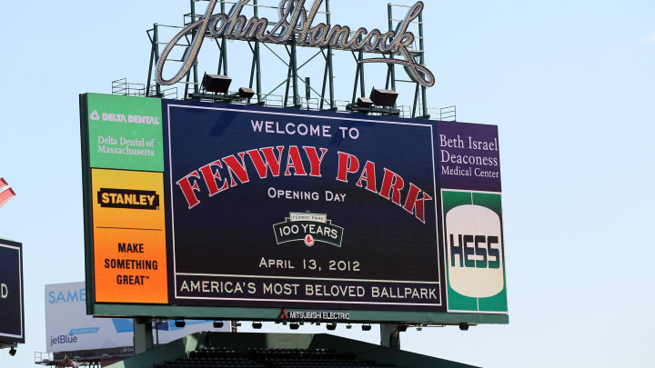 BOSTON, MA – APRIL 13: General view of the bleacher seats scoreboard before the game between the Boston Red Sox and the Tampa Bay Rays during the home opener on April 13, 2012 at Fenway Park in Boston, Massachusetts. (Photo by Elsa/Getty Images)