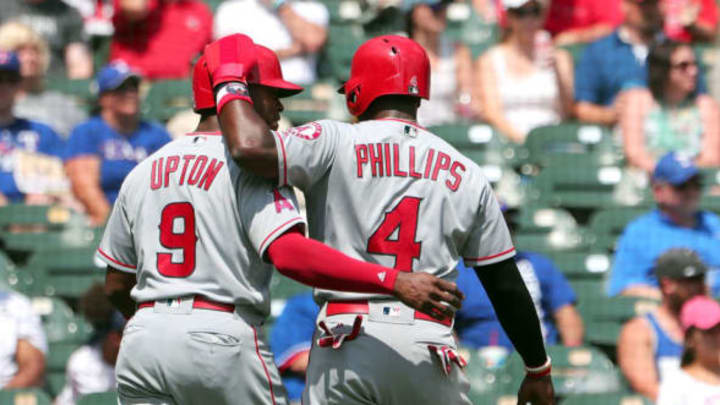 ARLINGTON, TX – SEPTEMBER 03: Justin Upton and Brandon Phillips (Photo by Richard W. Rodriguez/Getty Images)