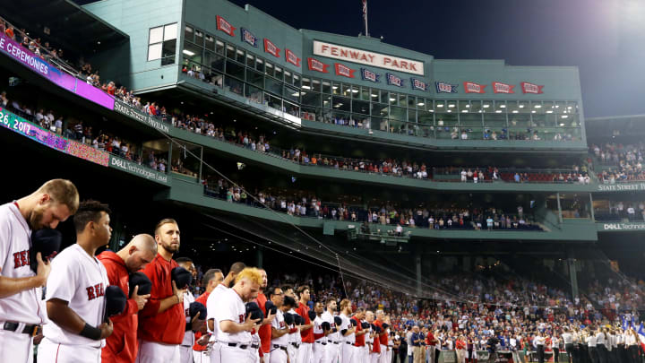 BOSTON, MA – SEPTEMBER 26: Members of the Boston Red Sox stand for the national anthem before their game against the Toronto Blue Jays at Fenway Park on September 26, 2017 in Boston, Massachusetts. (Photo by Maddie Meyer/Getty Images)