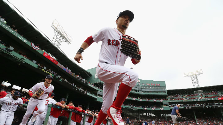 BOSTON, MA – OCTOBER 09: Mookie Betts #50 of the Boston Red Sox takes the field before game four of the American League Division Series between the Houston Astros and the Boston Red Sox at Fenway Park on October 9, 2017 in Boston, Massachusetts. (Photo by Maddie Meyer/Getty Images)