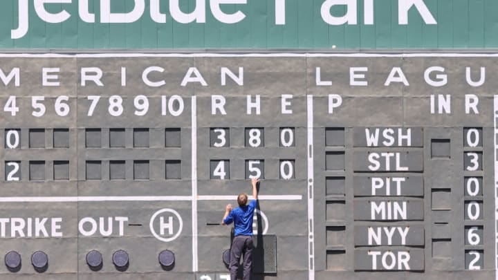 FORT MYERS, FL - MARCH 26: The scoreboard in left field gets updated between innings during the game between the Baltimore Orioles and the Boston Red Sox at JetBlue Park at Fenway South on March 26, 2014 in Fort Myers, Florida. The Orioles defeated the Red Sox 5-4. (Photo by Leon Halip/Getty Images)
