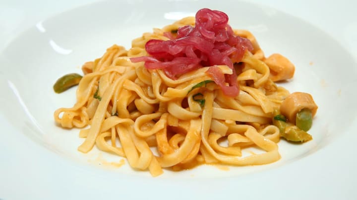 NEW YORK, NY – OCTOBER 13: Tagliolini pasta made by chef Jorge Espinoza is served during the Marc Forgione and Jorge Espinoza dinner presented by Ferguson Bath, Kitchen & Lighting Gallery at Scarpetta on October 13, 2017 in New York City. (Photo by Astrid Stawiarz/Getty Images for NYCWFF)