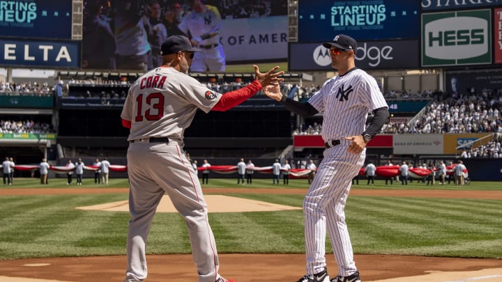 NEW YORK, NY – APRIL 8: Manager Alex Cora of the Boston Red Sox shakes hands with Manager Aaron Boone of the New York Yankees before the 2022 Major League Baseball Opening Day game on April 8, 2022 at Yankee Stadium in the Bronx borough of New York City. (Photo by Billie Weiss/Boston Red Sox/Getty Images)