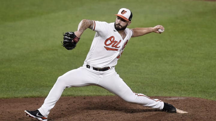 BALTIMORE, MARYLAND – AUGUST 25: Tanner Scott #66 of the Baltimore Orioles pitches against the Los Angeles Angels at Oriole Park at Camden Yards on August 25, 2021 in Baltimore, Maryland. (Photo by G Fiume/Getty Images)