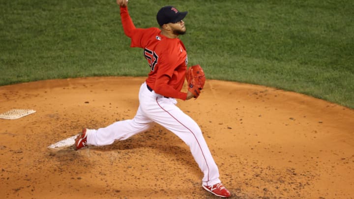 BOSTON, MASSACHUSETTS - OCTOBER 18: Eduardo Rodriguez #57 of the Boston Red Sox pitches against the Houston Astros in the third inning of Game Three of the American League Championship Series at Fenway Park on October 18, 2021 in Boston, Massachusetts. (Photo by Omar Rawlings/Getty Images)