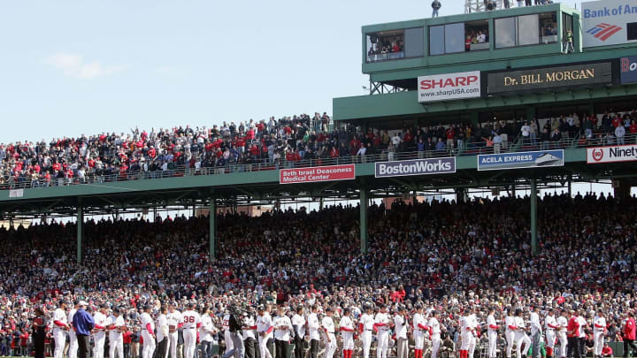 BOSTON, MA – APRIL 11: Members of the Boston Red Sox line up after receiving their World Series rings before playing the New York Yankees at Fenway Park on April 11, 2005 in Boston, Massachusetts. (Photo by Jim McIsaac/Getty Images)