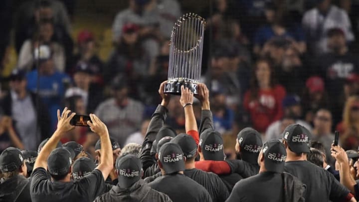 LOS ANGELES, CA - OCTOBER 28: The Boston Red Sox celebrate with the World Series trophy after their 5-1 win over the Los Angeles Dodgers in Game Five to win the 2018 World Series at Dodger Stadium on October 28, 2018 in Los Angeles, California. (Photo by Kevork Djansezian/Getty Images)