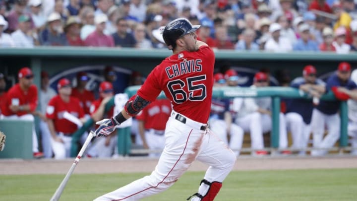 FORT MYERS, FL - FEBRUARY 23: Michael Chavis #65 of the Boston Red Sox hits a three-run home run in the third inning of a Grapefruit League spring training game against the New York Yankees at JetBlue Park at Fenway South on February 23, 2019 in Fort Myers, Florida. (Photo by Joe Robbins/Getty Images)