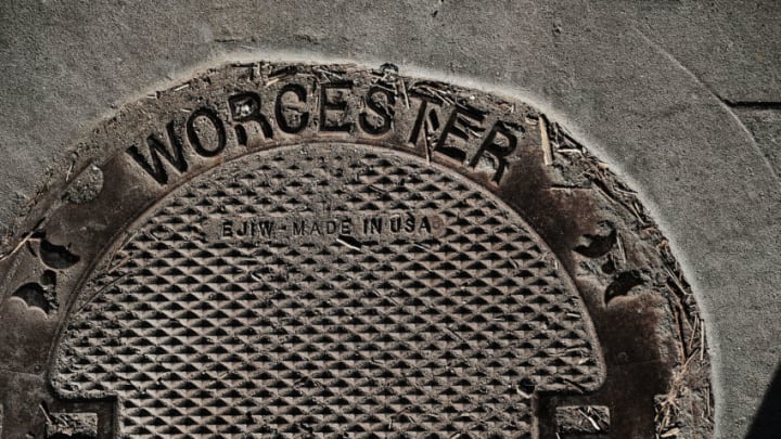 WORCESTER, MA - MARCH 20: A sewer grate is adorned with the name Worcester in an economically stressed section of the city on March 20, 2018 in Worcester, Massachusetts. Worcester, once a thriving manufacturing hub, has recently made moves into the medical industry, education and as a metropolitan hub for refugees in an attempt to revive its moribund economy. Like a growing number of Northeastern cities, Worcester has a chronic problem with homelessness and opioid addiction. The latest data in 2016 showed that 24.4% of Worcester residents were living below the poverty level. With overdoses increasing, the city plans to file litigation against pharmaceutical manufacturers and distributors of opioid products. (Photo by Spencer Platt/Getty Images)