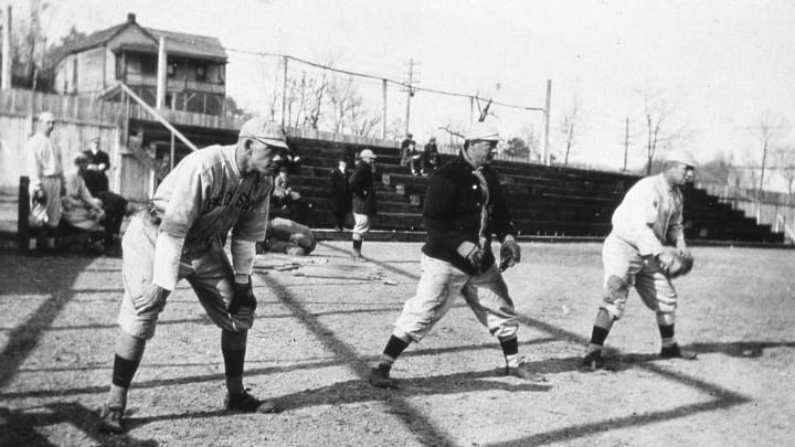 HOT SPRINGS, AR – MARCH, 1912. The speedy outfield for the Boston Red Sox, (L-R) Duffy Lewis, Harry Hooper, and Tris Speaker, pose together at Hot Springs, Arkansas during spring training workouts in March of 1912. (Photo by Mark Rucker/Transcendental Graphics, Getty Images)