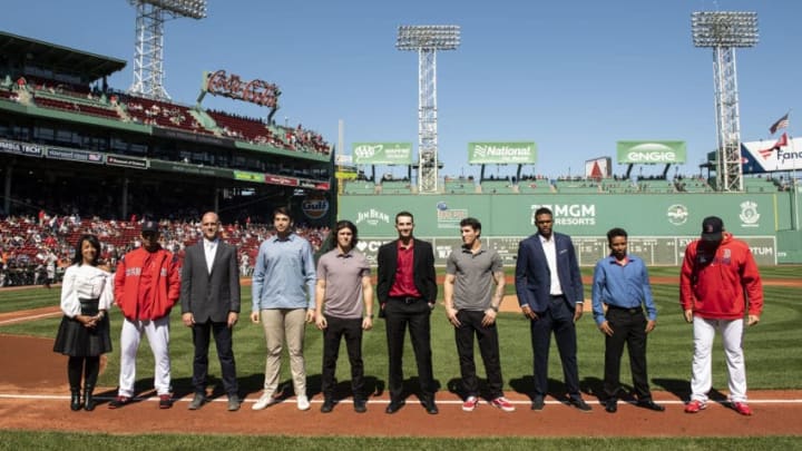 BOSTON, MA - SEPTEMBER 19: Senior Vice President of Major League & Minor League Operations Raquel Ferreira, manager Alex Cora, and Vice President of Player Development of the Boston Red Sox Ben Crockett, and rookies Tristan Casas, Ryan Fitzgerald, Thad Ward, Jarren Duran, Darel Belen, Nixson Munoz, and Trevor Kelley are introduced as the 2019 Minor League Awards winners before a game against the San Francisco Giants on September 19, 2019 at Fenway Park in Boston, Massachusetts. (Photo by Billie Weiss/Boston Red Sox/Getty Images)