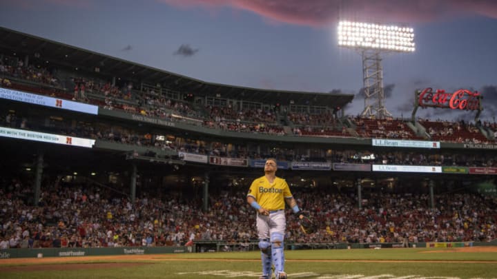 BOSTON, MA - JULY 25: Christian Vázquez #7 of the Boston Red Sox walks to the dugout during a rain delay in the third inning of a game against the Cleveland Guardians on July 25, 2022 at Fenway Park in Boston, Massachusetts. (Photo by Maddie Malhotra/Boston Red Sox/Getty Images)