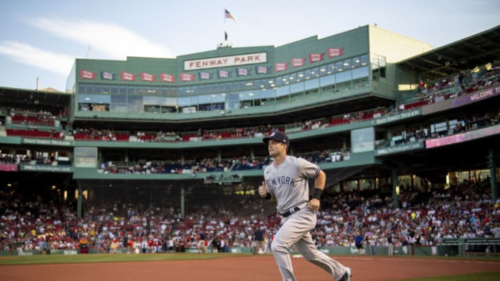 BOSTON, MA - AUGUST 12: Andrew Benintendi #18 of the New York Yankees warms up before a game against the Boston Red Sox on August 12, 2022 at Fenway Park in Boston, Massachusetts.(Photo by Billie Weiss/Boston Red Sox/Getty Images)